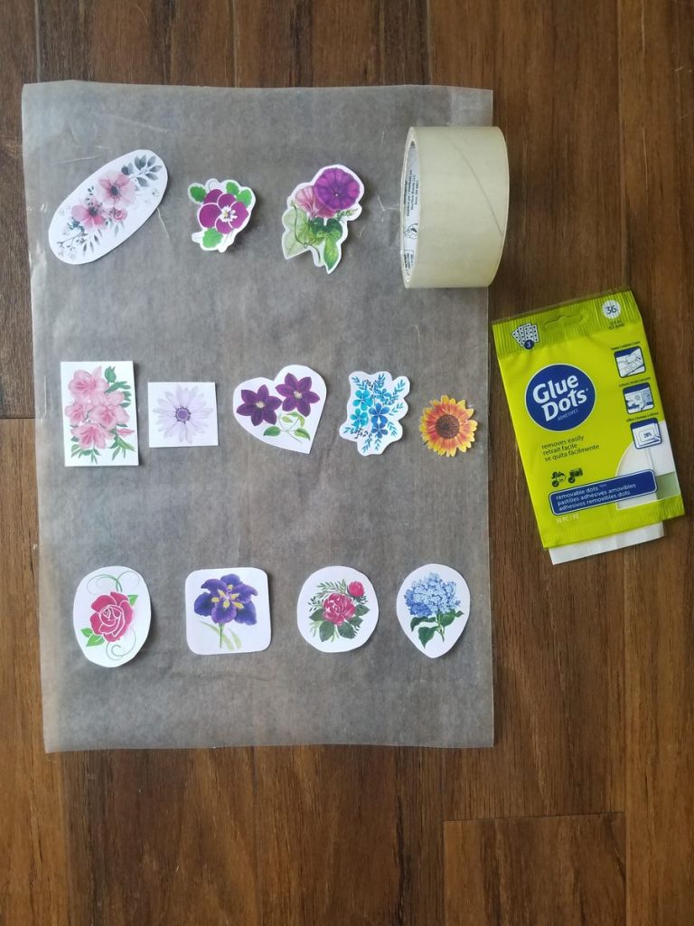 DIY stickers laying on strips of tape
