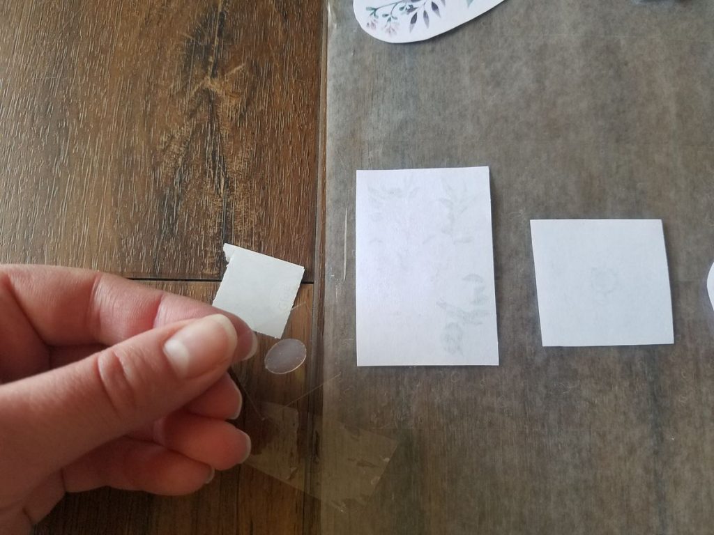 Removing parchment paper from glue dot