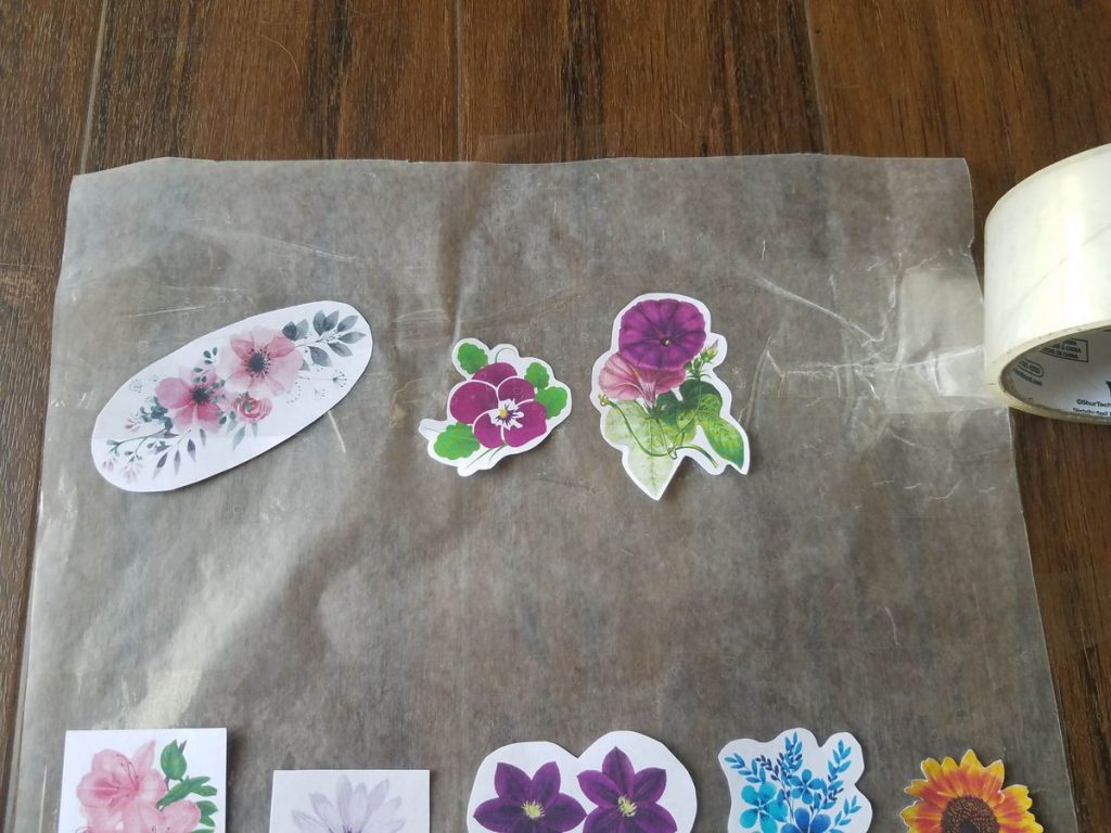 Adding a top layer of tape over stickers