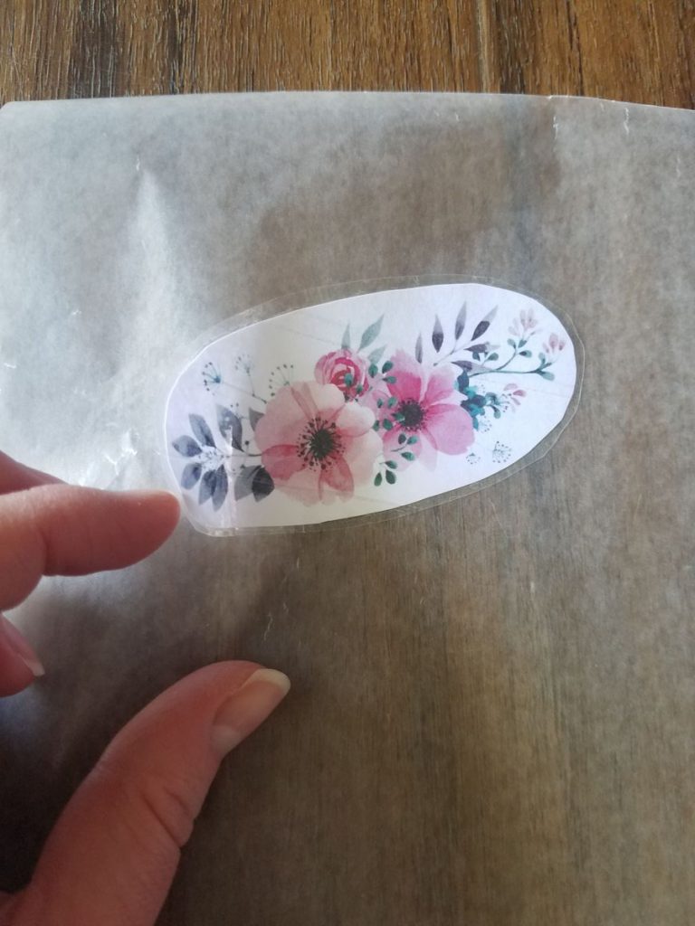 sticker laid sticky side down on wax paper