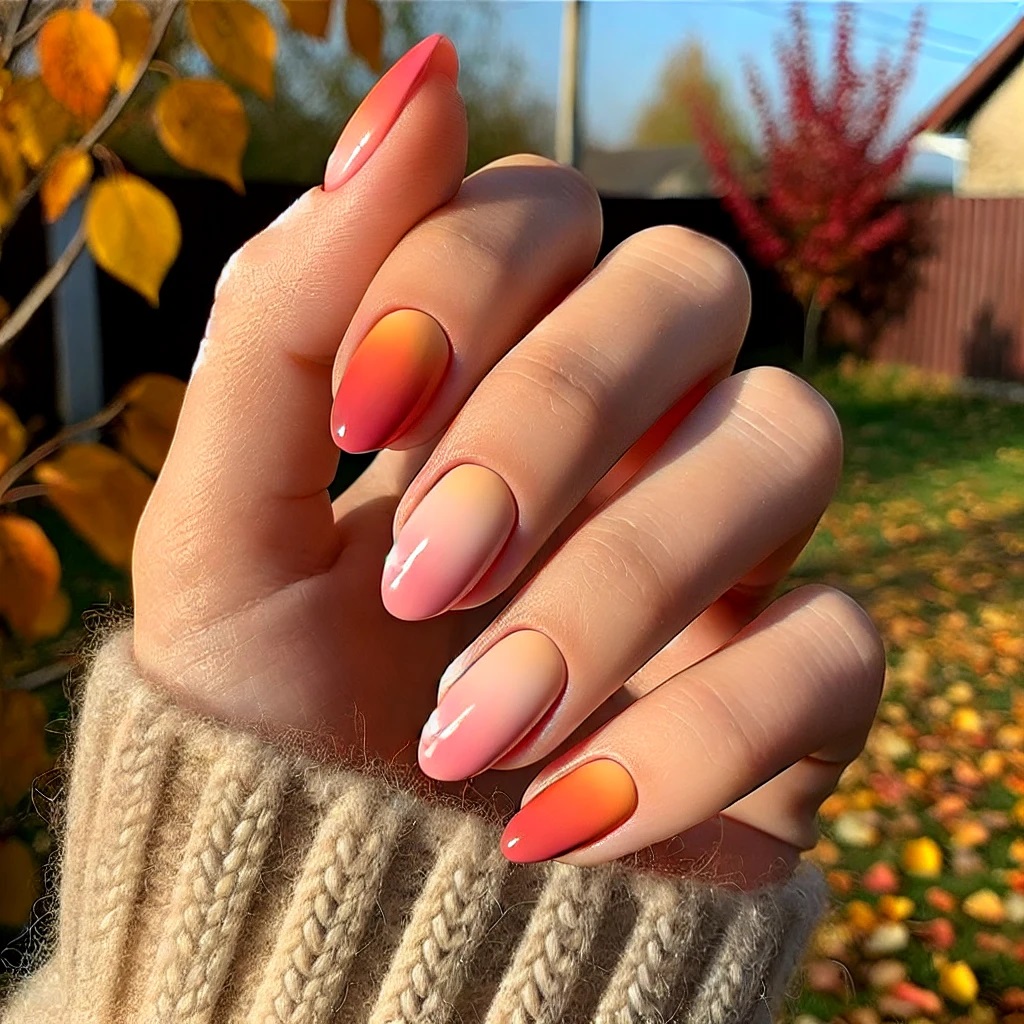 autumn gradient nails from deep orange to pink