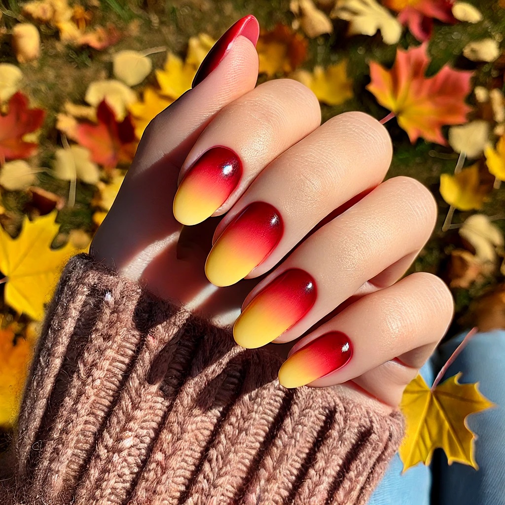 ombre nails from deep red to golden yellow tips